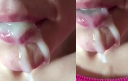 Постер к видео: Девушка пьет густую сперму и лакомится облизывая сперму с губ.